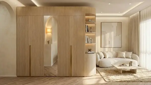 Oak wall cabinetry with an arched opening and open shelving beside a curved sofa