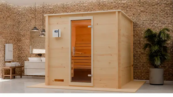 Indoor sauna cabin with glass door in a brick-walled bathroom
