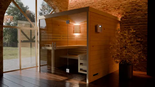 Indoor sauna with glass front and warm interior lighting